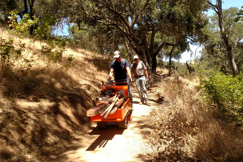 Chris driving down the new track-barrow.